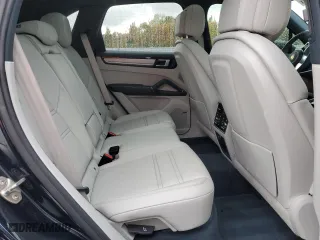 2023 Porsche Cayenne with VIN WP1AA2AY8PDA07877, listed as a Copart auction lot 77680334 with 22,398 mi miles and Salvage Title. Bid and sale history available at carsss.com. Image 10.