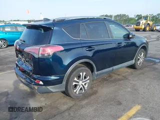 2017 Toyota RAV4 LE with VIN JTMZFREV4HJ136104, listed as a IAAI auction lot 42077699 with 120,360 mi miles and . Bid and sale history available at carsss.com. Image 4.