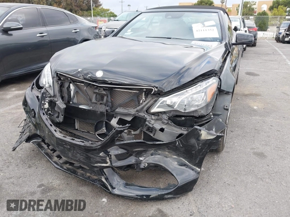 2016 Mercedes-Benz E E 400 with VIN WDDKK6FF7GF339417, listed as a IAAI auction lot 42111352 with 59,859 mi miles. Bid and sale history available at carsss.com. Image 6.