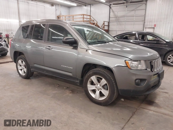 2013 Jeep Compass Sport with VIN 1C4NJDBBXDD225517, listed as a IAAI auction lot 41271099 with 168,204 mi miles. Bid and sale history available at carsss.com. Image 1.