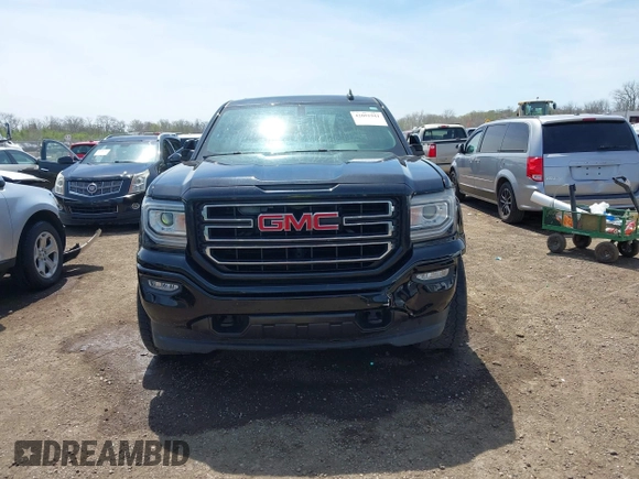 2017 GMC Sierra 1500 SLE z VIN 1GTV2MEC2HZ105964, wystawiony jako IAAI lot #42091941 z przebiegiem 93 779 mil mil oraz . Historia ofert i sprzedaży dostępna na DreamBid. Obrazek 12.