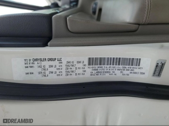 2011 Jeep Grand Cherokee Laredo with VIN 1J4RR4GG1BC669834, listed as a IAAI auction lot 42019804 with 173,943 mi miles. Bid and sale history available at carsss.com. Image 8.