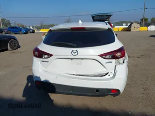 2014 Mazda 3 i Grand Touring with VIN JM1BM1M7XE1102093, listed as a IAAI auction lot 41344433 with 148,395 mi miles and . Bid and sale history available at DreamBid. Image 16.