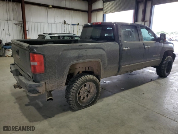2015 GMC Sierra 2500HD Denali with VIN 1GT120E84FF514856, listed as a Copart auction lot 61423374 with 204,130 mi miles and Salvage Title. Bid and sale history available at carsss.com. Image 3.