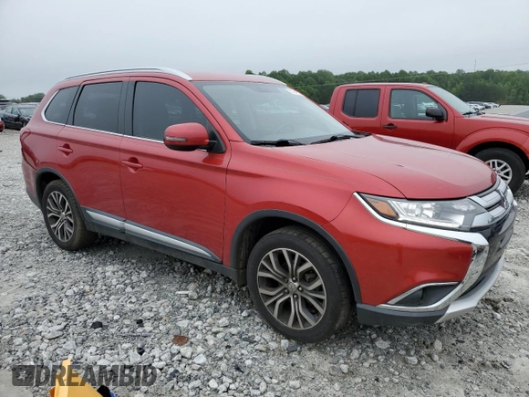2018 Mitsubishi Outlander SE with VIN JA4AD3A33JZ013478, listed as a Copart auction lot 57941215 with 130,824 mi miles and Salvage title. Bid and sale history available at DreamBid. Image 4.