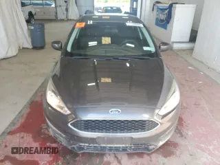 2018 Ford Focus SE z VIN 1FADP3F25JL257815, wystawiony jako Copart lot #61978045 z przebiegiem 62 328 mil mil oraz Szkoda całkowita • Salvage title. Historia ofert i sprzedaży dostępna na DreamBid. Obrazek 5.