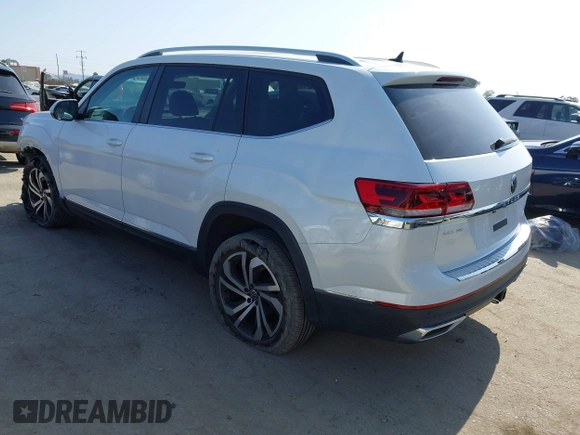 2023 Volkswagen Atlas SEL with VIN 1V2BR2CA7PC527099, listed as a IAAI auction lot 42099076 with 13,710 mi miles and . Bid and sale history available at DreamBid. Image 3.