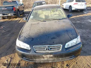 2001 Toyota Camry CE with VIN JT2BG22K210598164, listed as a IAAI auction lot 41457913 with 129,198 mi miles. Bid and sale history available at carsss.com. Image 6.