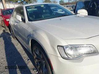 2016 Chrysler 300 Anniversary Edition with VIN 2C3CCAAG6GH343881, listed as a IAAI auction lot 41593752 with 135,719 mi miles and . Bid and sale history available at DreamBid. Image 6.
