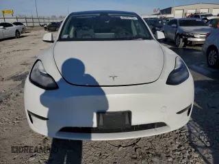 2024 Tesla Model Y с VIN 7SAYGDED5RF086943, выставлен на аукционе Copart как лот 43781735 с пробегом 11 954 миль миль и Списание • Salvage title. История ставок и продаж доступна на DreamBid. Изображение 5.