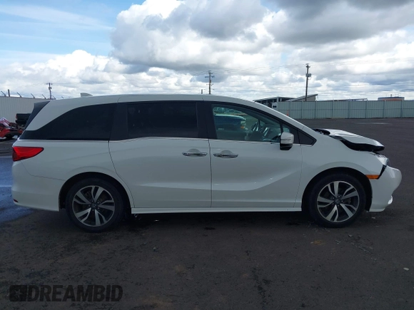 2022 Honda Odyssey Touring with VIN 5FNRL6H8XNB057293, listed as a IAAI auction lot 41826014 with 30,454 mi miles and . Bid and sale history available at DreamBid. Image 13.