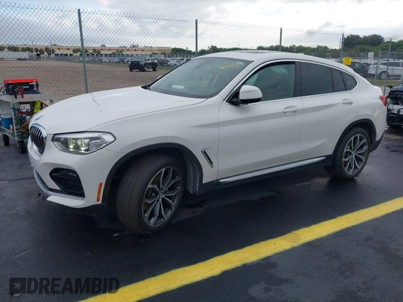 2020 BMW X4 xDrive30i z VIN 5UX2V1C02LLE68148, wystawiony jako IAAI lot #42253362 z przebiegiem 80 865 mil mil oraz . Historia ofert i sprzedaży dostępna na DreamBid. Obrazek 2.