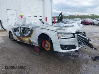 2017 Audi A8 Sport z VIN WAU43AFD7HN005877, wystawiony jako IAAI lot #42172112 z przebiegiem Nie podano mil oraz . Historia ofert i sprzedaży dostępna na DreamBid. Obrazek 1.