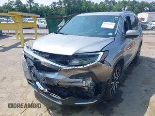 2019 Honda Pilot Elite with VIN 5FNYF6H08KB025449, listed as a IAAI auction lot 42450139 with 98,368 mi miles and . Bid and sale history available at DreamBid. Image 6.