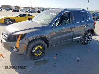 2014 Volkswagen Tiguan SEL с VIN WVGAV3AX6EW030705, выставлен на аукционе Copart как лот 52156805 с пробегом 142 377 миль миль и Списание • Salvage title. История ставок и продаж доступна на DreamBid. Изображение 1.