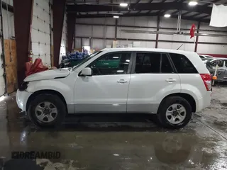 2011 Suzuki Grand Vitara Premium z VIN JS3TD0D24B4101861, wystawiony jako IAAI lot #41620401 z przebiegiem 151 034 mil mil oraz . Historia ofert i sprzedaży dostępna na DreamBid. Obrazek 14.