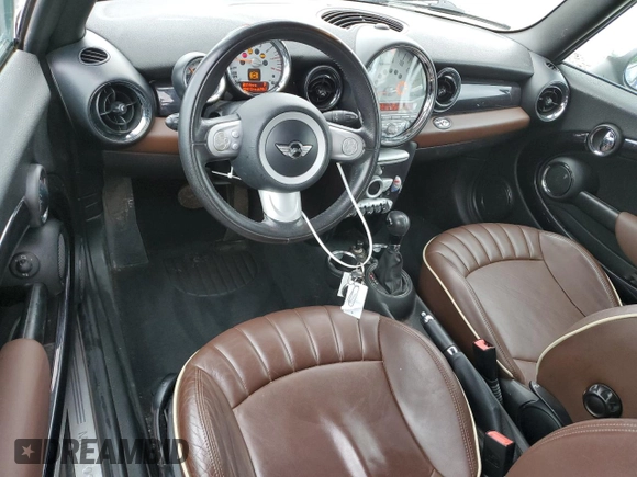 2009 MINI Convertible with VIN WMWMR33579TU96147, listed as a Copart auction lot 60124945 with 94,612 mi miles and Non repairable. Bid and sale history available at DreamBid. Image 8.