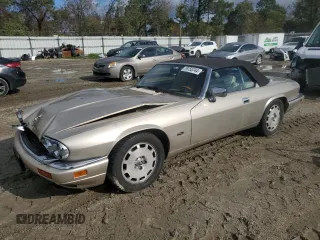 1996 Jaguar XJS with VIN SAJNX2742TC224462, listed as a Copart auction lot 79755744 with 120,724 mi miles and Salvage Title. Bid and sale history available at carsss.com. Image 1.