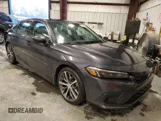 2022 Honda Civic Touring z VIN 2HGFE1F92NH315300, wystawiony jako Copart lot #44444605 z przebiegiem 52 469 mil mil oraz Szkoda całkowita • Salvage title. Historia ofert i sprzedaży dostępna na DreamBid. Obrazek 4.