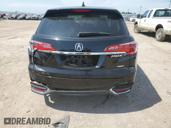 2016 Acura RDX Technology with VIN 5J8TB4H56GL012825, listed as a Copart auction lot 61005445 with 129,242 mi miles and Salvage title. Bid and sale history available at DreamBid. Image 6.