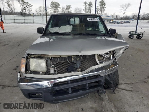 1999 Nissan Frontier XE with VIN 1N6DD26SXXC344449, listed as a Copart auction lot 43748015 with 137,318 mi miles and Salvage title. Bid and sale history available at DreamBid. Image 5.