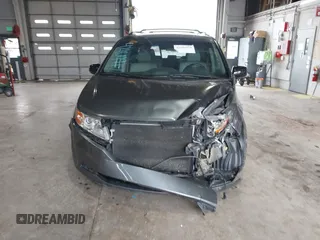2011 Honda Odyssey Touring с VIN 5FNRL5H90BB025855, выставлен на аукционе IAAI как лот 42104979 с пробегом 165 010 миль миль и . История ставок и продаж доступна на DreamBid. Изображение 13.