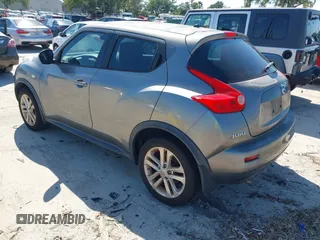 2014 Nissan Juke S with VIN JN8AF5MRXET353882, listed as a IAAI auction lot 42041965 with 239,606 mi miles. Bid and sale history available at carsss.com. Image 3.