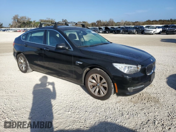2012 BMW 5 Series GT 535i Gran Turismo xDrive with VIN WBASP2C52CC338622, listed as a Copart auction lot 77604564 with 110,876 mi miles and Salvage Title. Bid and sale history available at DreamBid. Image 4.