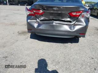 2019 Toyota Camry LE with VIN 4T1B11HK4KU286959, listed as a IAAI auction lot 42063344 with 92,481 mi miles and . Bid and sale history available at DreamBid. Image 16.