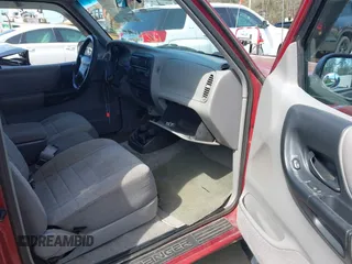 1997 Ford Ranger XLT with VIN 1FTCR15XXVTA14735, listed as a IAAI auction lot 42113672 with 114,939 mi miles. Bid and sale history available at carsss.com. Image 5.