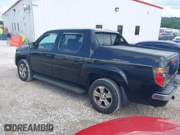 2006 Honda Ridgeline RTL with VIN 2HJYK165X6H558475, listed as a IAAI auction lot 42555097 with 180,711 mi miles and . Bid and sale history available at DreamBid. Image 3.