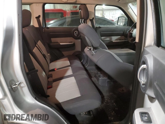 2010 Dodge Nitro SXT z VIN 1D4PU5GK7AW112562, wystawiony jako Copart lot #45113225 z przebiegiem 150 183 mil mil oraz Szkoda całkowita • Salvage title. Historia ofert i sprzedaży dostępna na DreamBid. Obrazek 11.