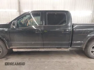 2015 Ford F-150 XLT w/HD Payload Pkg with VIN 1FTFW1EGXFFA39852, listed as a IAAI auction lot 41769971 with 163,929 mi miles. Bid and sale history available at carsss.com. Image 15.