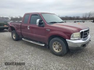 2004 Ford Super Duty F-250 XL with VIN 1FTNX20L14EB41045, listed as a Copart auction lot 82009234 with 226,464 mi miles and Salvage Title. Bid and sale history available at carsss.com. Image 4.