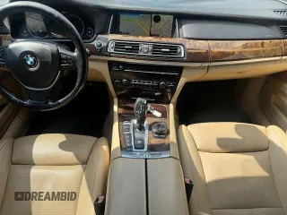 2015 BMW 7 Series 750i xDrive с VIN WBAYB6C5XFD965910, выставлен на аукционе Copart как лот 62613175 с пробегом 173 486 миль миль и Списание • Salvage title. История ставок и продаж доступна на DreamBid. Изображение 8.