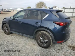 2021 Mazda CX-5 Touring with VIN JM3KFACM1M0313910, listed as a Copart auction lot 47834815 with 40,671 mi miles and Salvage Title. Bid and sale history available at carsss.com. Image 2.