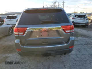 2011 Jeep Grand Cherokee Overland with VIN 1J4RS6GGXBC601757, listed as a Copart auction lot 82770454 with 132,109 mi miles and Salvage Title. Bid and sale history available at DreamBid. Image 6.