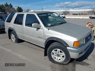 1997 Honda Passport z VIN 4S6CM58V4V4409765, wystawiony jako IAAI lot #41792688 z przebiegiem 124 222 mil mil oraz . Historia ofert i sprzedaży dostępna na DreamBid. Obrazek 1.