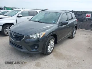 2014 Mazda CX-5 Grand Touring with VIN JM3KE2DY0E0354220, listed as a IAAI auction lot 41885502 with 168,901 mi miles. Bid and sale history available at carsss.com. Image 17.