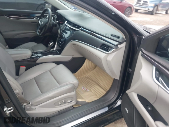 2017 Cadillac XTS Luxury with VIN 2G61M5S38H9151248, listed as a IAAI auction lot 42111780 with 76,494 mi miles. Bid and sale history available at carsss.com. Image 5.