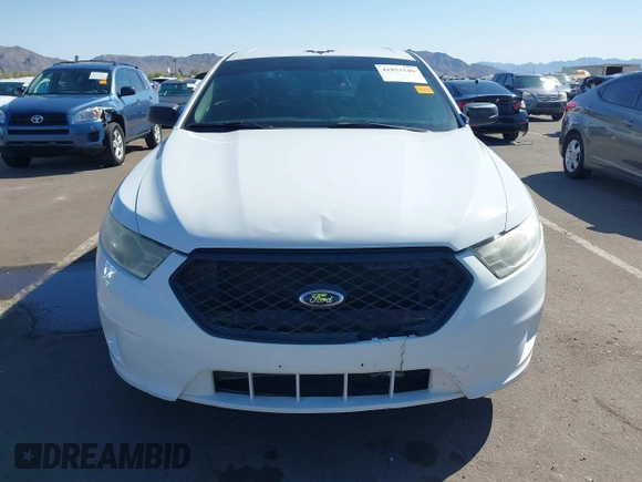 2013 Ford Police Interceptor z VIN 1FAHP2M82DG132383, wystawiony jako IAAI lot #41851540 z przebiegiem 172 639 mil mil oraz . Historia ofert i sprzedaży dostępna na DreamBid. Obrazek 12.