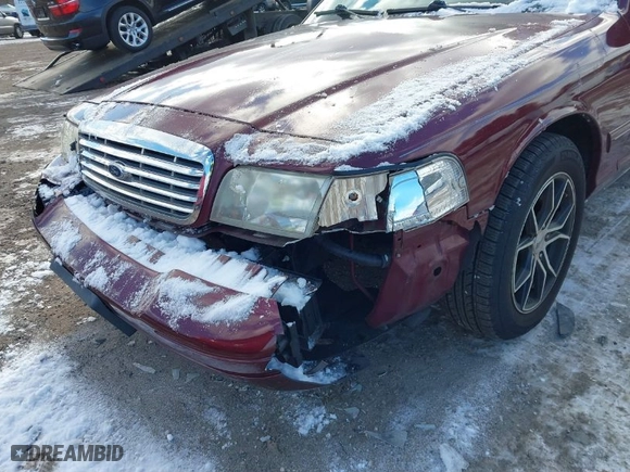 2004 Ford Crown Victoria Standard with VIN 2FAFP73W74X150232, listed as a IAAI auction lot 41277271 with 146,518 mi miles. Bid and sale history available at carsss.com. Image 12.