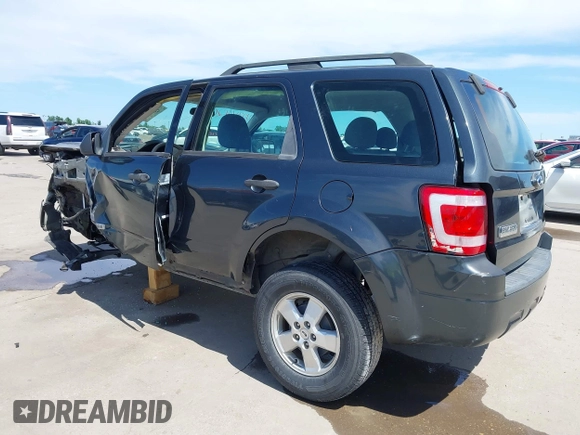 2008 Ford Escape XLS z VIN 1FMCU02Z28KD32661, wystawiony jako IAAI lot #42316426 z przebiegiem 184 552 mil mil oraz . Historia ofert i sprzedaży dostępna na DreamBid. Obrazek 3.