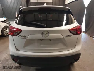 2015 Mazda CX-5 Touring with VIN JM3KE4CY4F0509530, listed as a IAAI auction lot 41858134 with 102,360 mi miles. Bid and sale history available at carsss.com. Image 16.