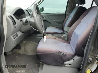 2015 Nissan Frontier SV z VIN 1N6AD0FRXFN722101, wystawiony jako Copart lot #76144314 z przebiegiem 87 902 mil mil oraz Szkoda całkowita • Salvage title. Historia ofert i sprzedaży dostępna na DreamBid. Obrazek 7.