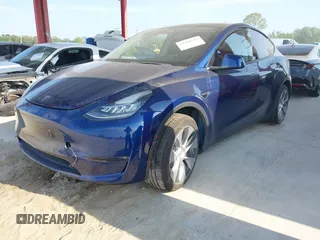 2022 Tesla Model Y Long Range z VIN 7SAYGAEE2NF364733, wystawiony jako IAAI lot #42290231 z przebiegiem 33 907 mil mil oraz . Historia ofert i sprzedaży dostępna na DreamBid. Obrazek 2.