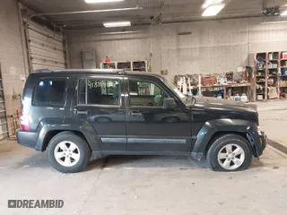 2009 Jeep Liberty Sport with VIN 1J8GN28K79W547903, listed as a IAAI auction lot 41889962 with 127,821 mi miles. Bid and sale history available at carsss.com. Image 13.