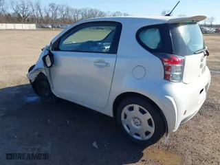 2012 Scion iQ with VIN JTNJJXB08CJ011734, listed as a IAAI auction lot 41769409 with 75,931 mi miles. Bid and sale history available at carsss.com. Image 3.
