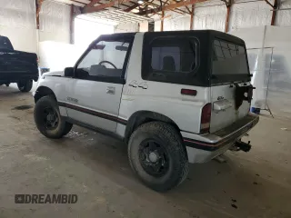 1990 Geo Tracker z VIN 2CNBJ18UXL6218795, wystawiony jako Copart lot #53083615 z przebiegiem 83 413 mil mil oraz Szkody całkowita. Historia ofert i sprzedaży dostępna na DreamBid. Obrazek 2.