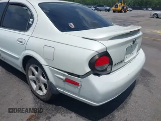 2000 Nissan Maxima GXE z VIN JN1CA31D6YT542083, wystawiony jako IAAI lot #42306685 z przebiegiem 296 613 mil mil oraz . Historia ofert i sprzedaży dostępna na DreamBid. Obrazek 6.